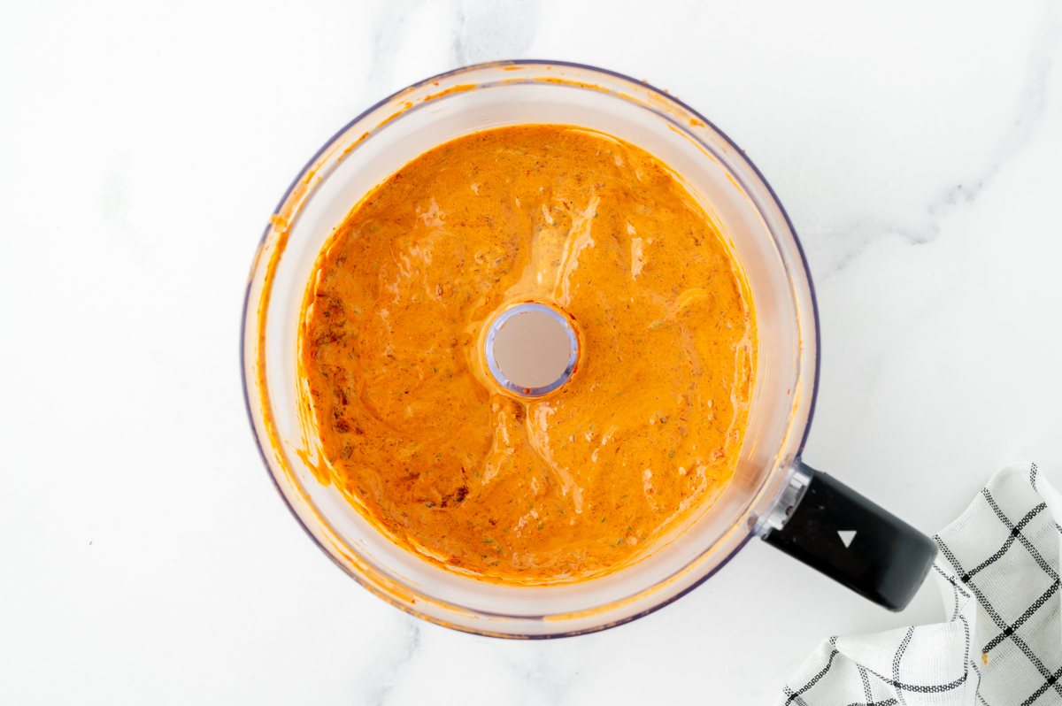 overhead shot of chipotle mayo in food processor