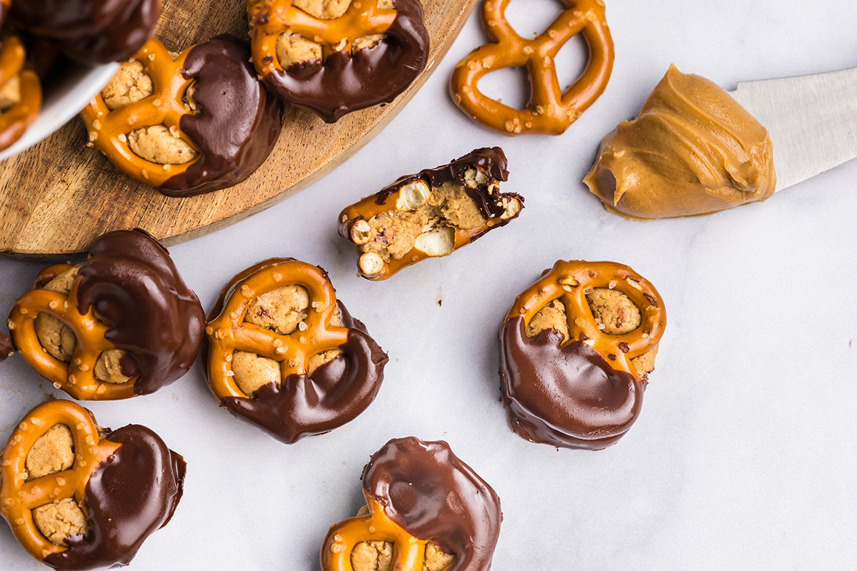 overhead shot of bite taken out of peanut butter pretzel bite