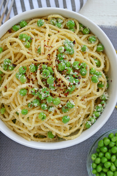 overhead shot of bowl of pasta and peas