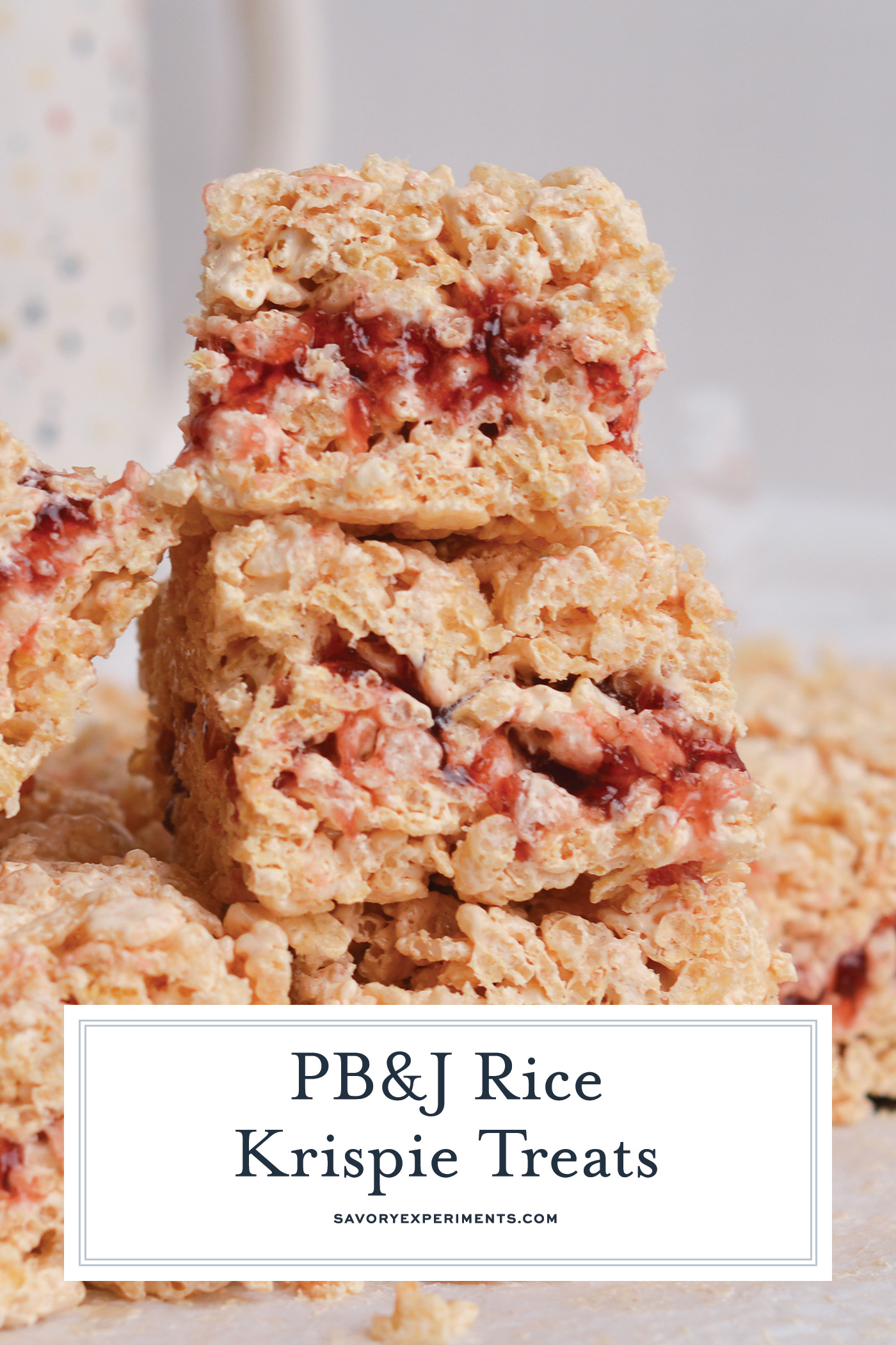 straight on shot of stack of peanut butter and jelly rice krispie treats with text overlay