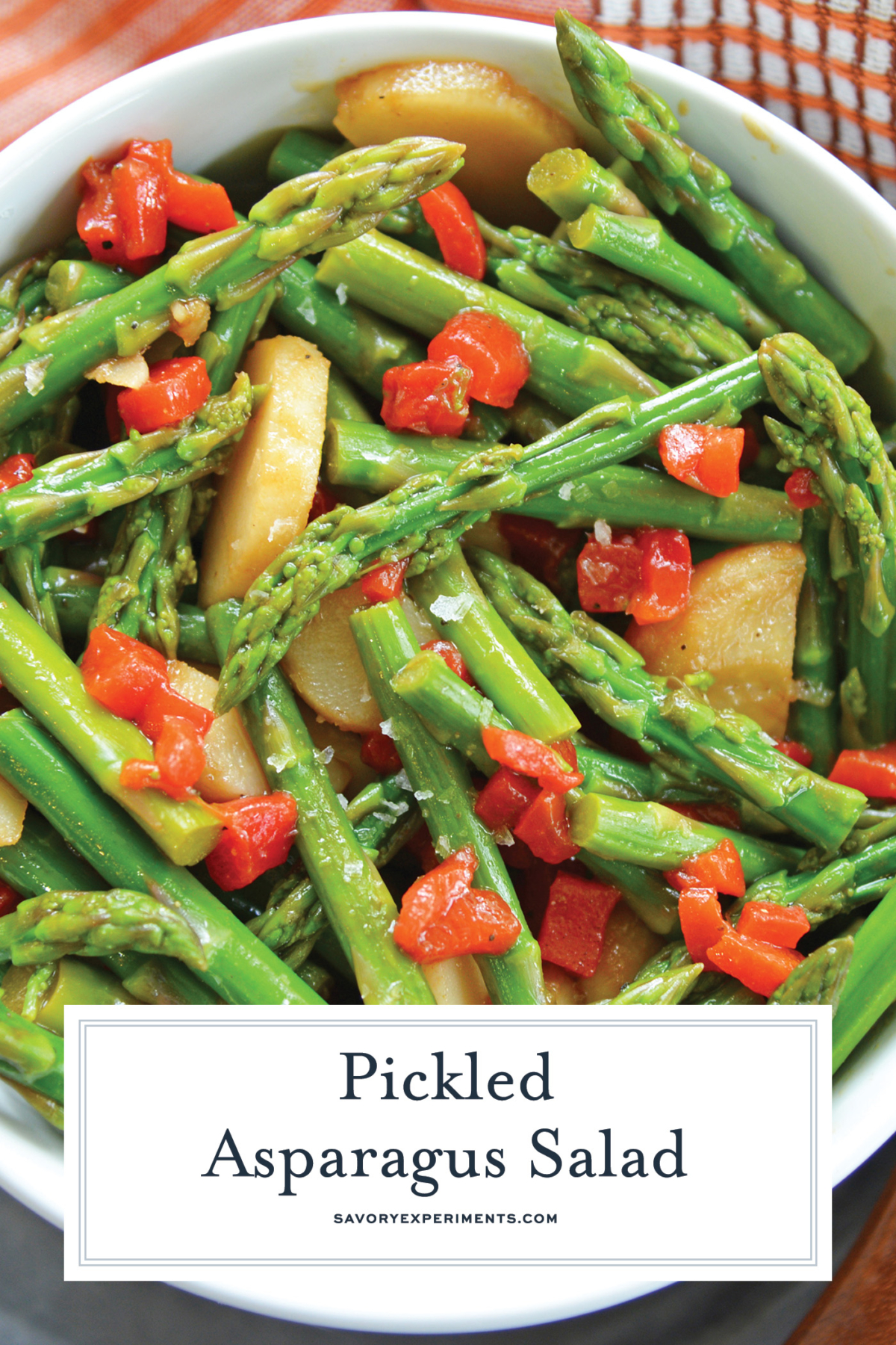 close up of marinated asparagus salad for pinterest