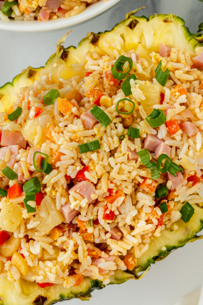 overhead shot of fried rice in a pineapple