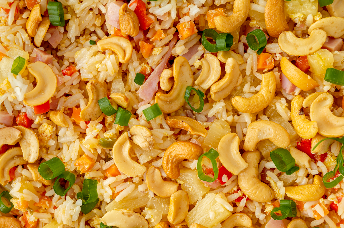 close up of cashews over pineapple fried rice