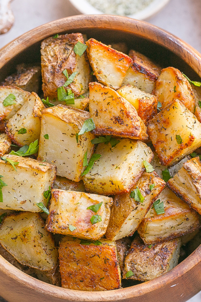 overhead shot of roasted potatoes in bowl