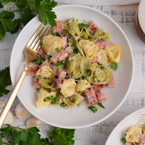 overhead shot of bowl of tortellini with ham