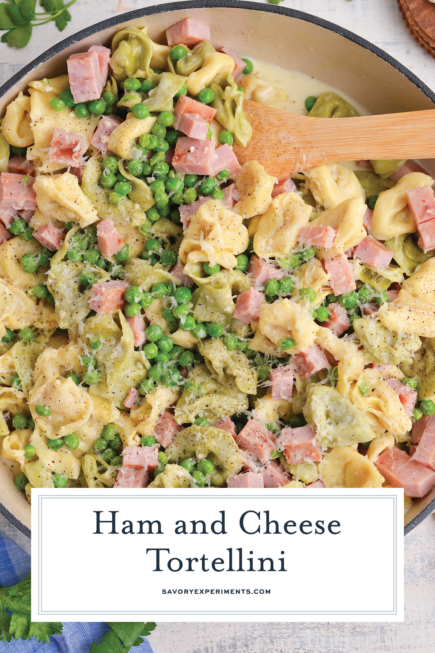 overhead shot of pan of ham and cheese tortellini with text overlay