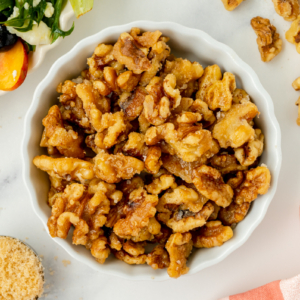 overhead shot of bowl of candied walnuts