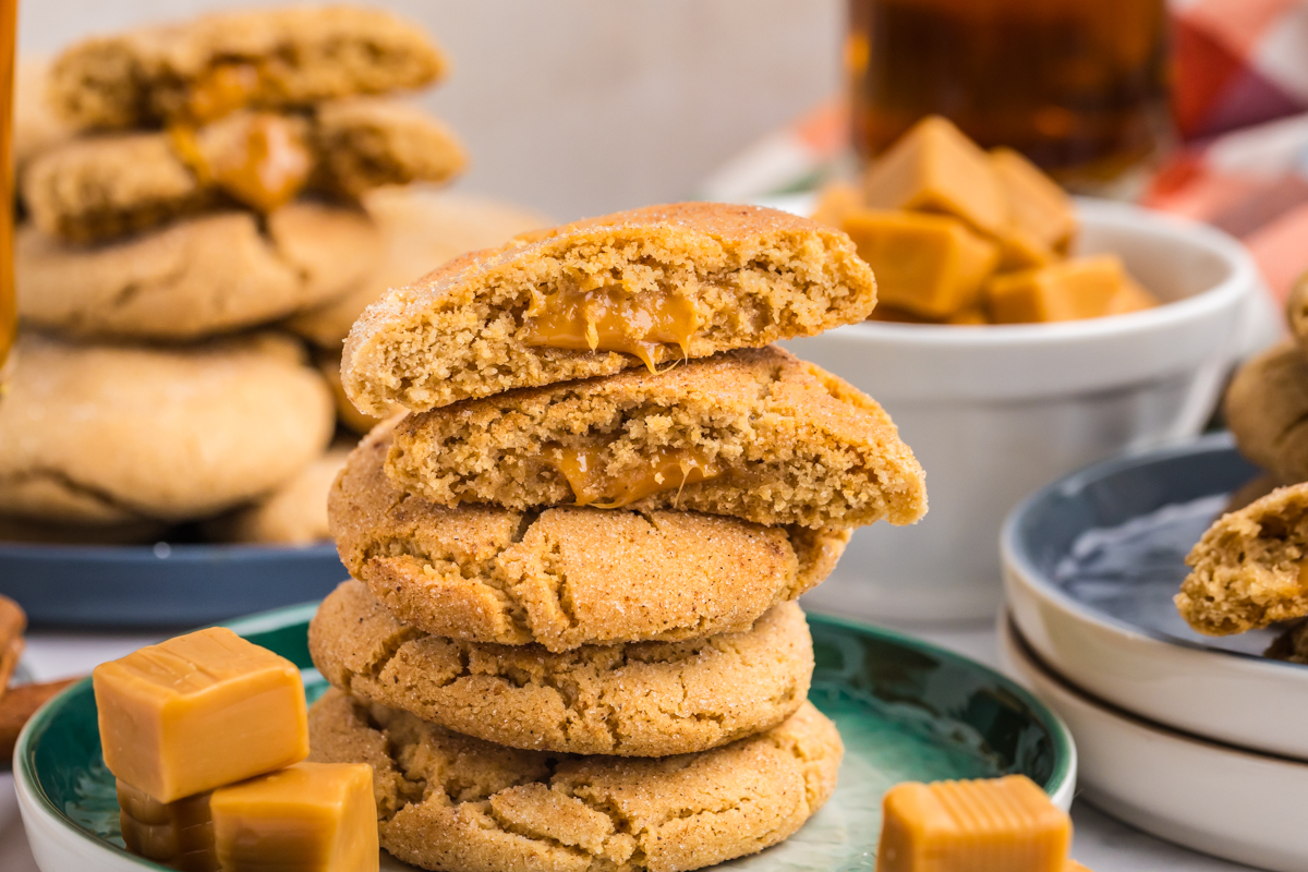 stack of caramel apple cookies with cookie broken in half