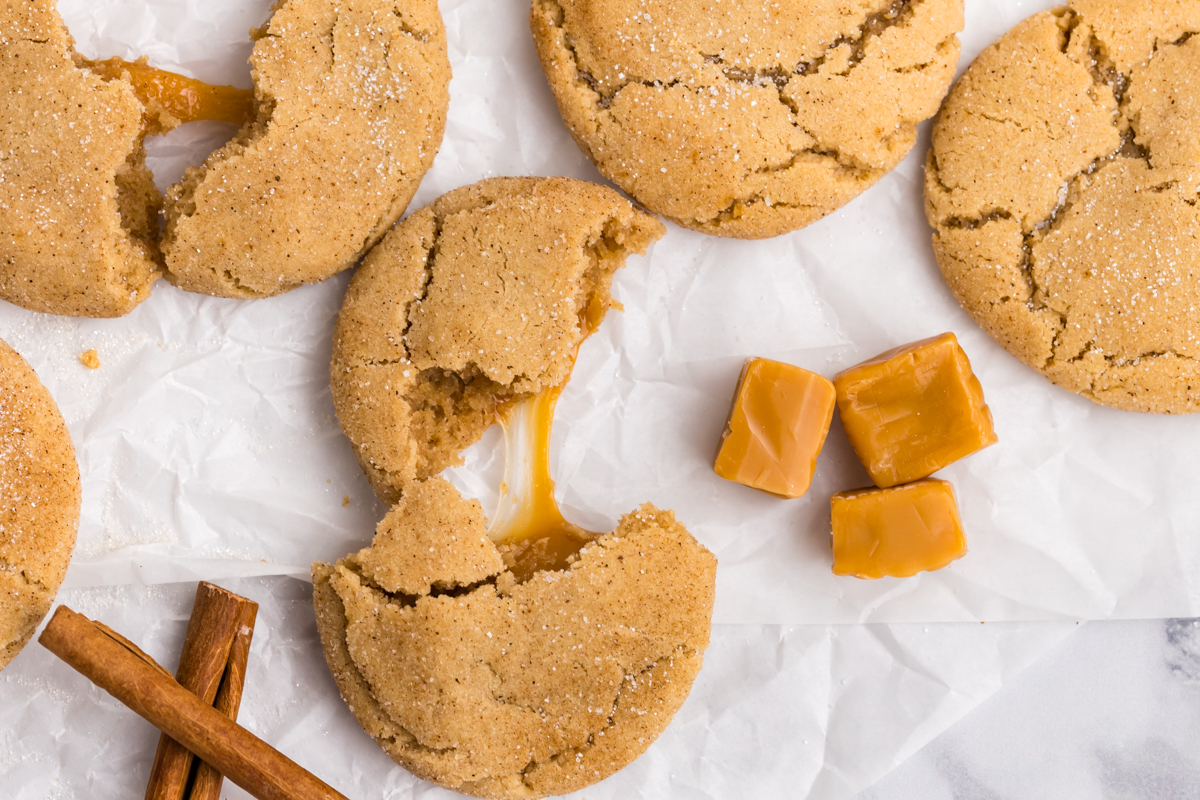 overhead shot of caramel apple cookies broken in half