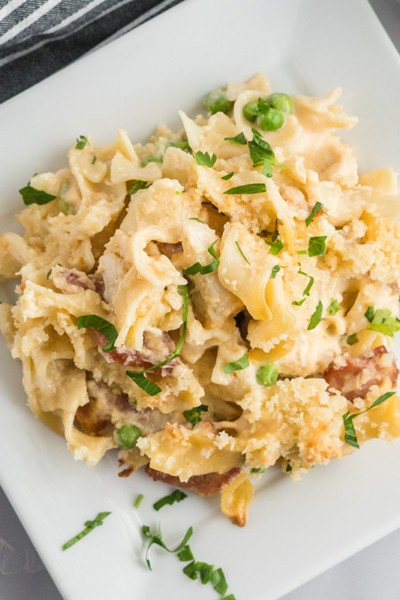 white plate with chicken noodle casserole