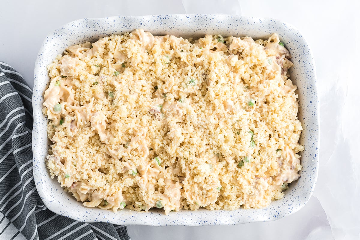 uncooked chicken noodle casserole in a baking dish