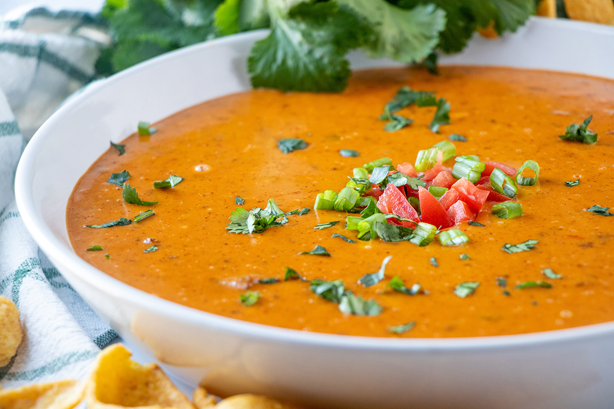 A bowl chili cheese dip