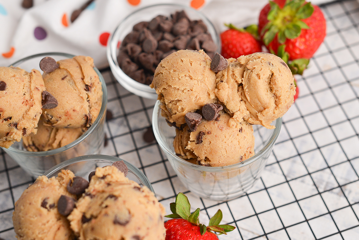 small glass bowls filled with edible cookie dough scoops