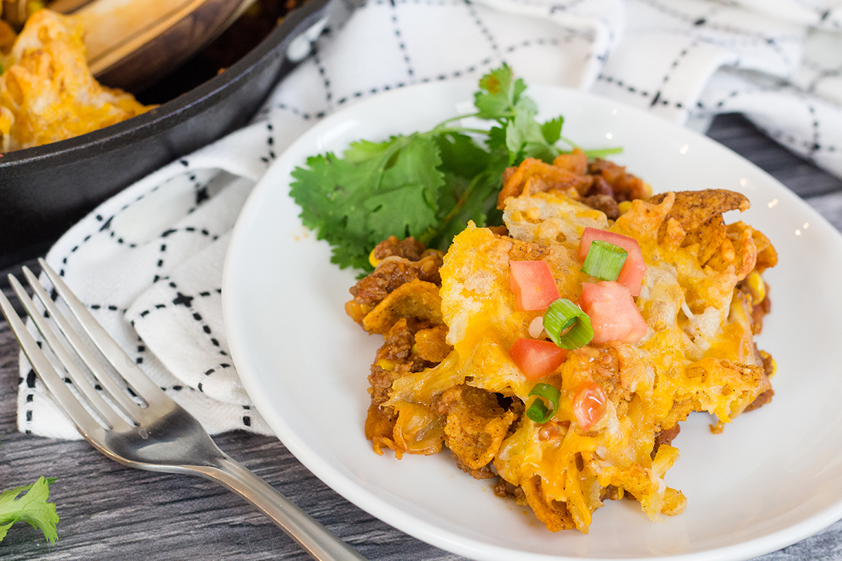 scoop of frito casserole on a white plate