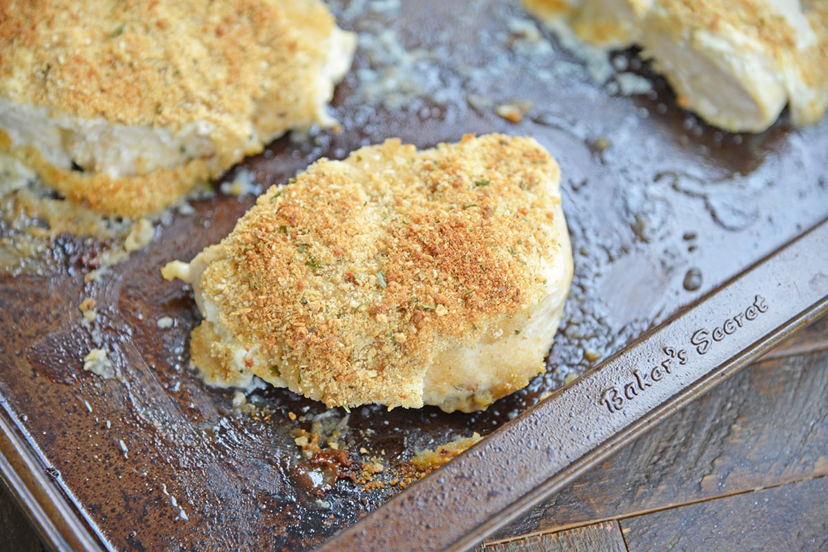 baked mayonnaise chicken on a baking sheet