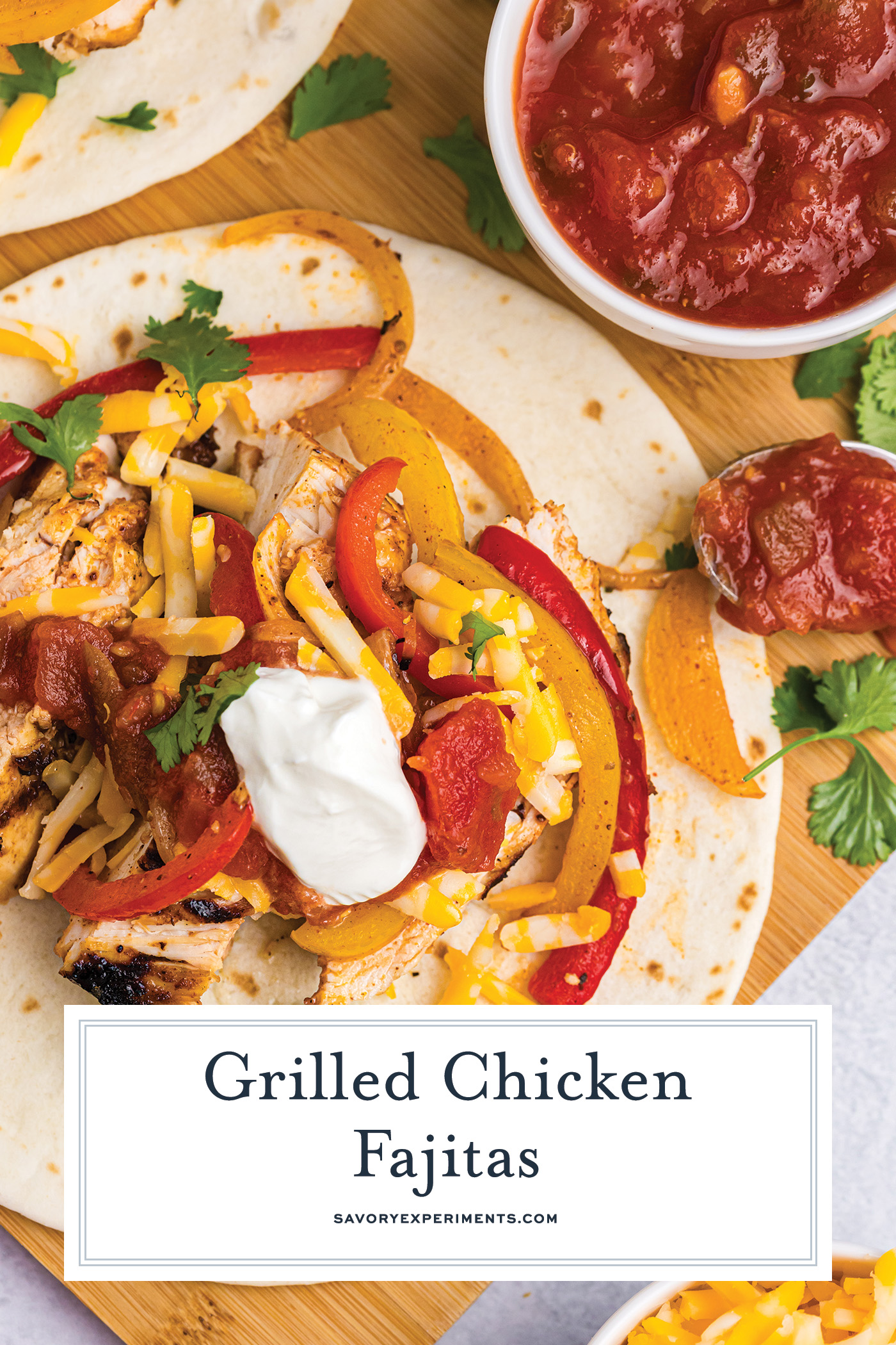 overhead shot of grilled chicken fajita on wooden board with text overlay