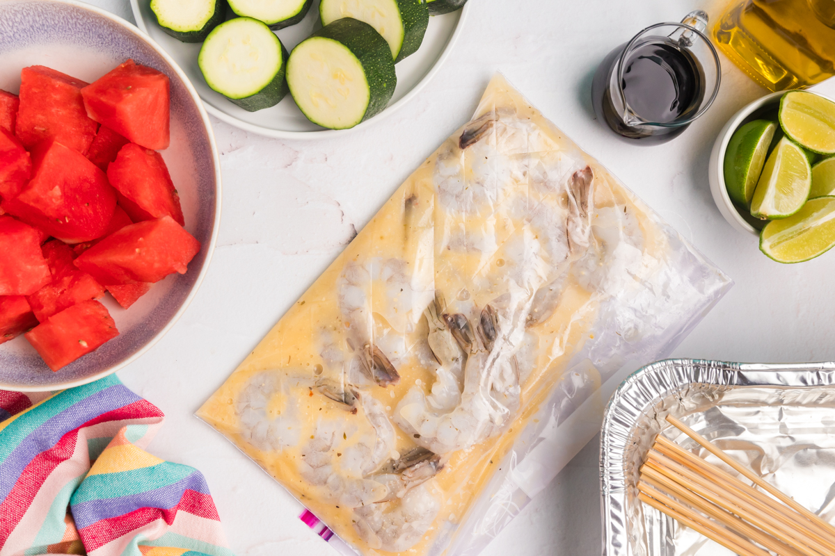 overhead shot of shrimp marinating in ziplock bag