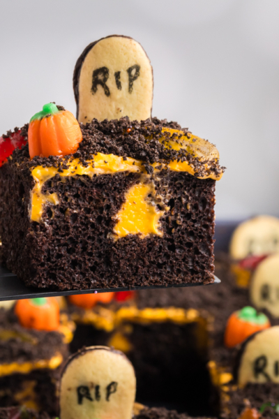 straight on shot of slice of graveyard cake on spatula