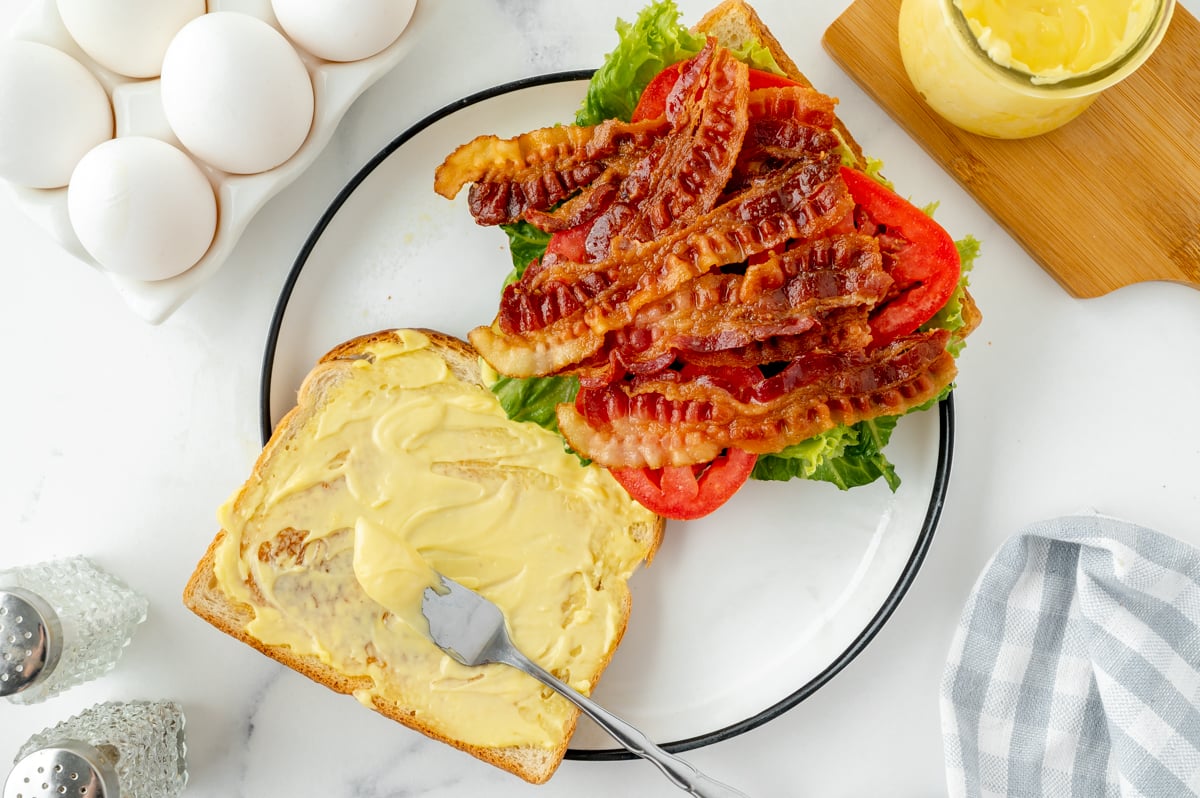 mayo slathered onto bread for blt