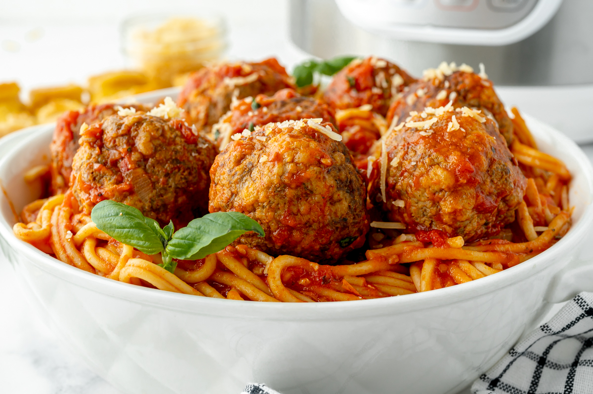 angled shot of bowl of instant pot spaghetti and meatballs