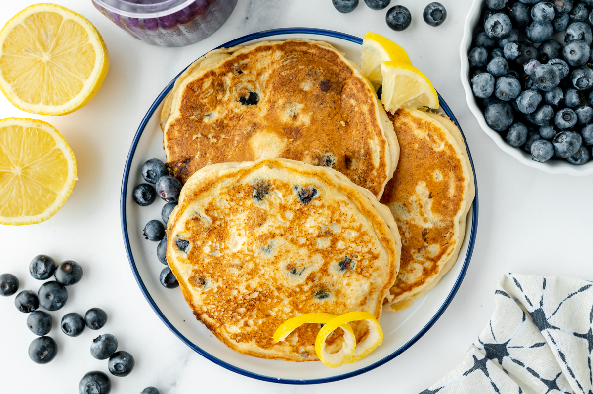 overhead shot of plate of lemon ricotta pancakes