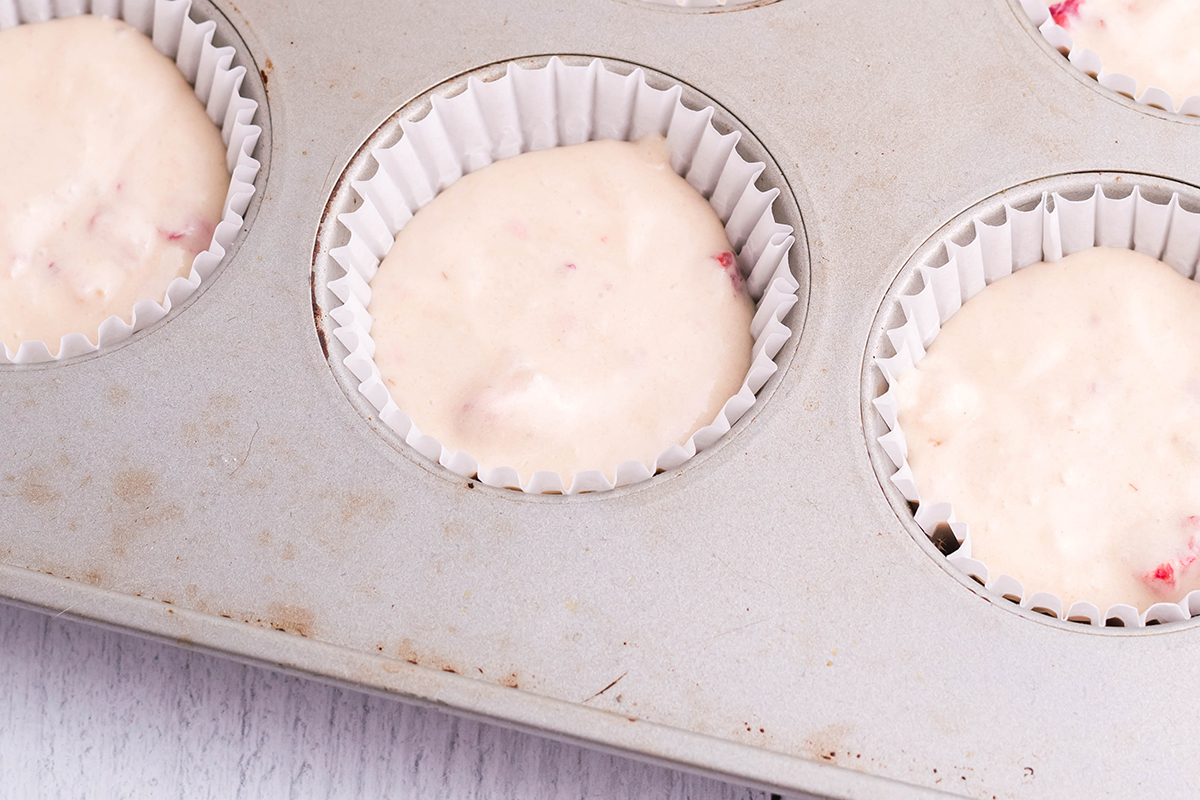 strawberry cupcake batter in liners