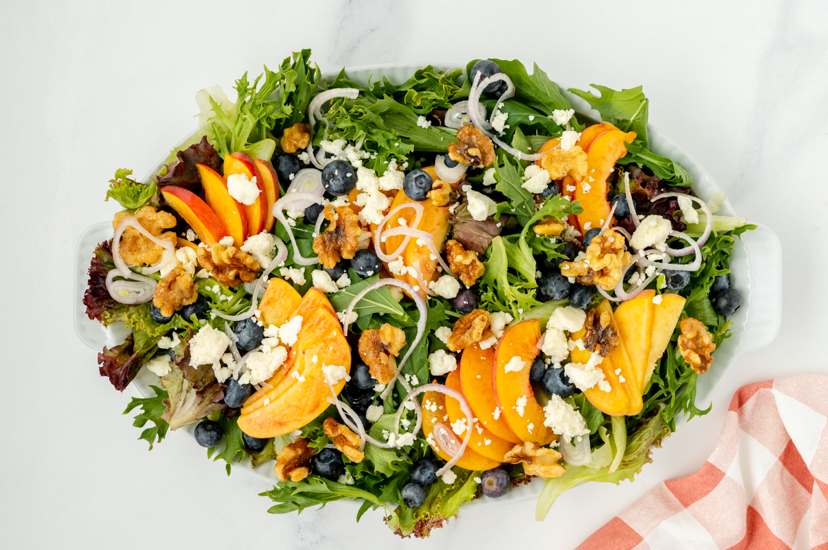 overhead shot of peach salad on platter