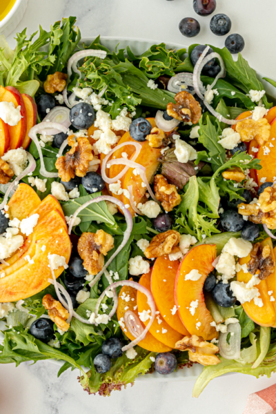 overhead shot of serving dish of peach salad