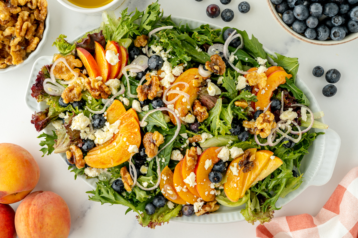 overhead shot of peach salad on platter