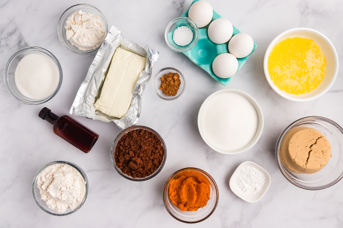 overhead shot of pumpkin cheesecake brownies ingredients