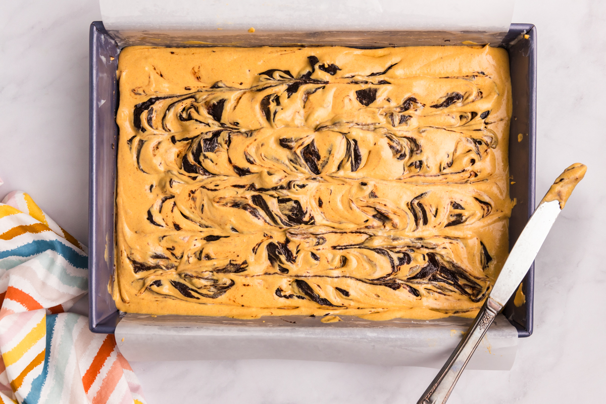 pumpkin cheesecake swirled with brownie batter