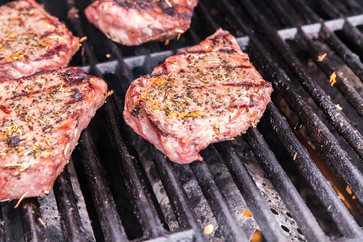 steak cooking on grill