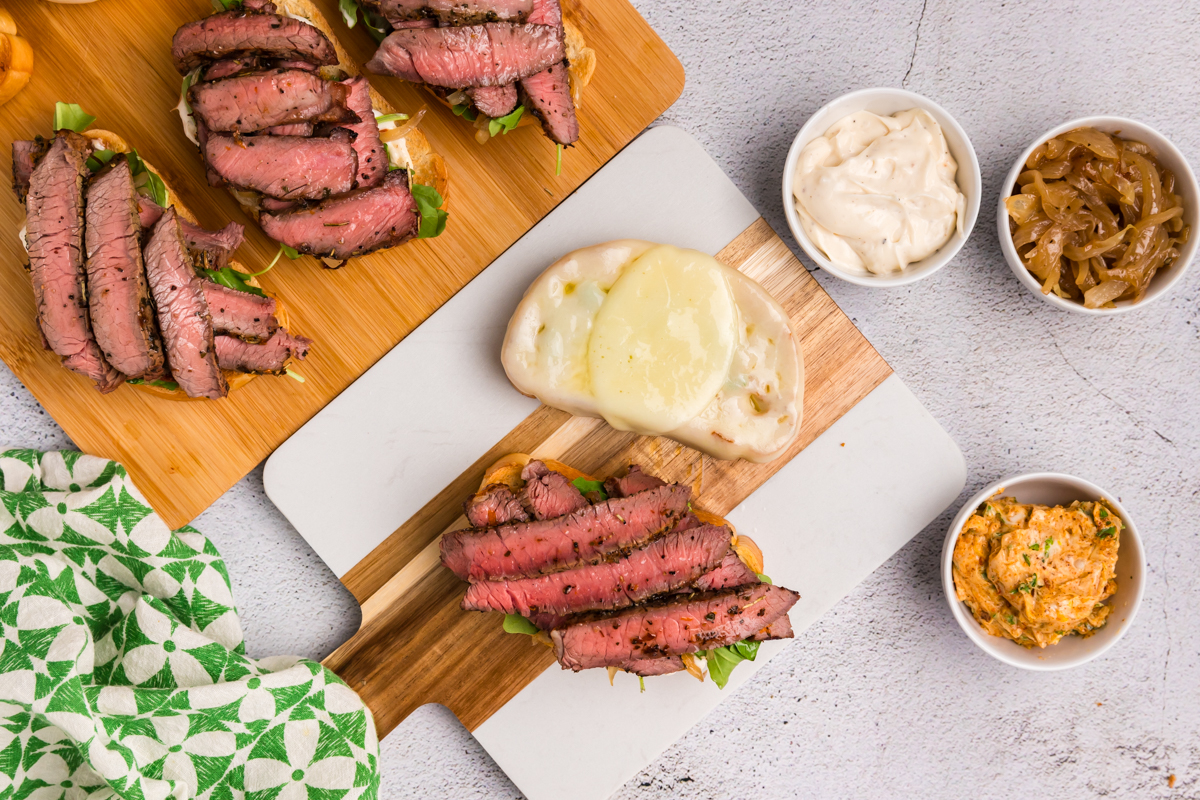 steak and cheese added to bread