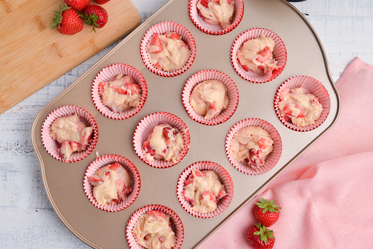 strawberry muffin batter in pan