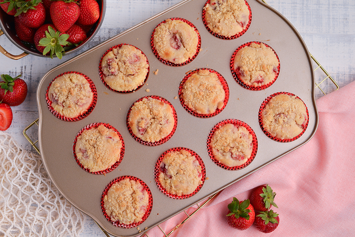 overhead shot of strawberry cream cheese muffins in pan