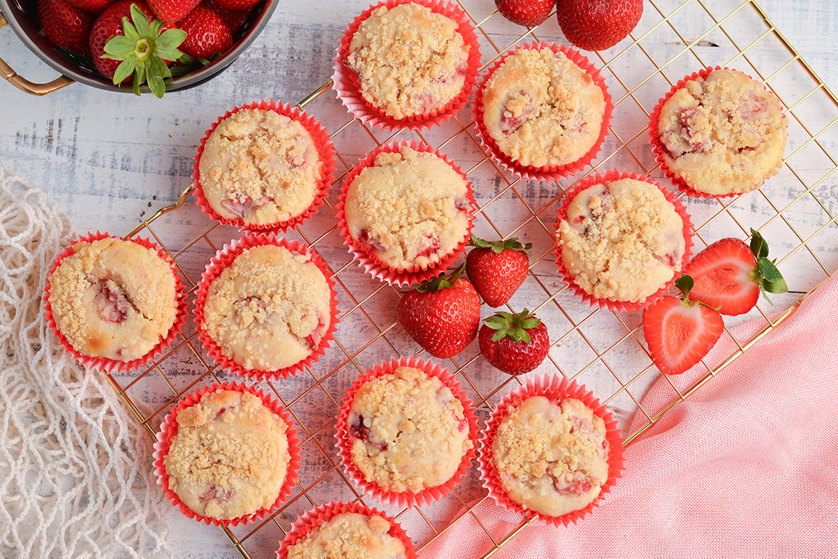 overhead shot of strawberry cream cheese muffins on cooling rack