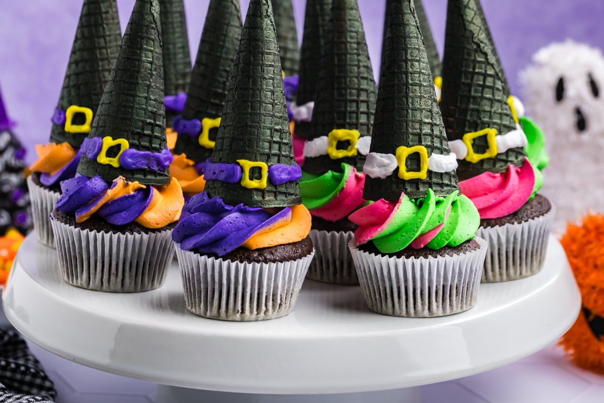 straight on shot of tray of witch hat cupcakes