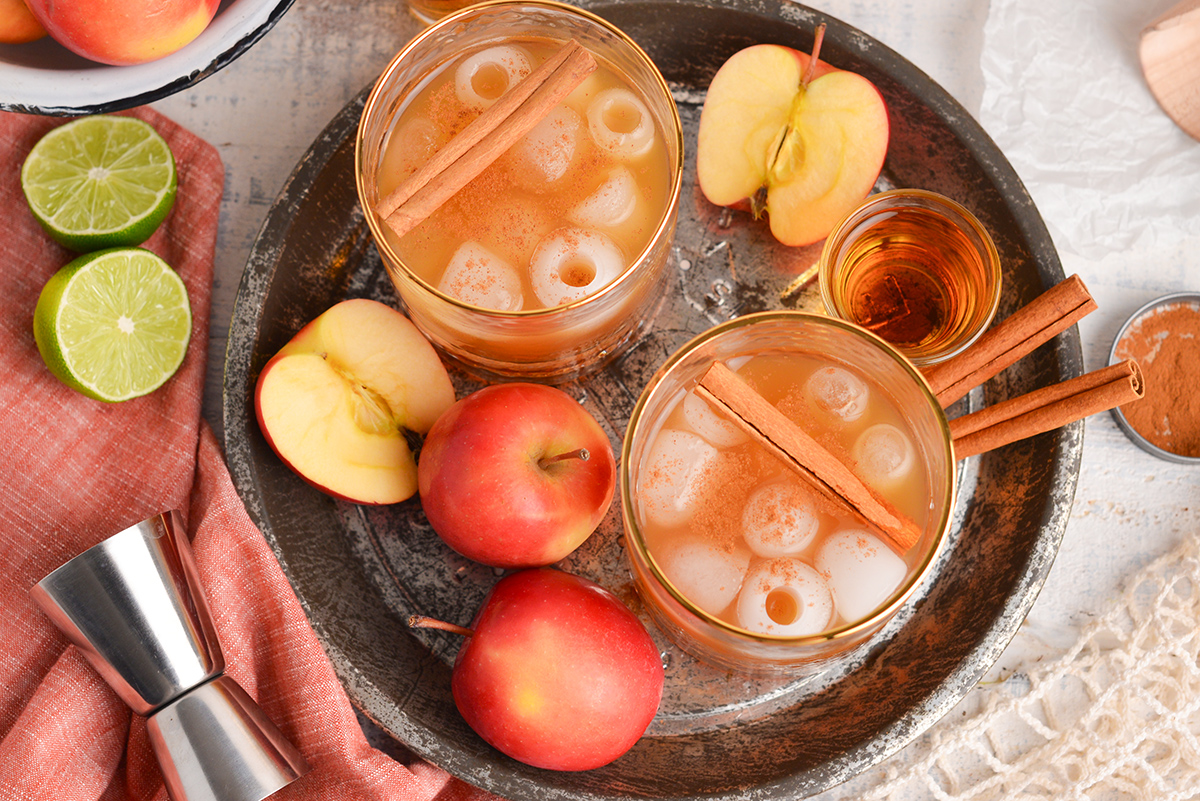 overhead shot of two apple cider whiskey cocktails