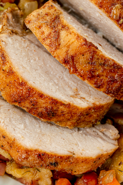 overhead shot of sliced apple spiced pork tenderloin