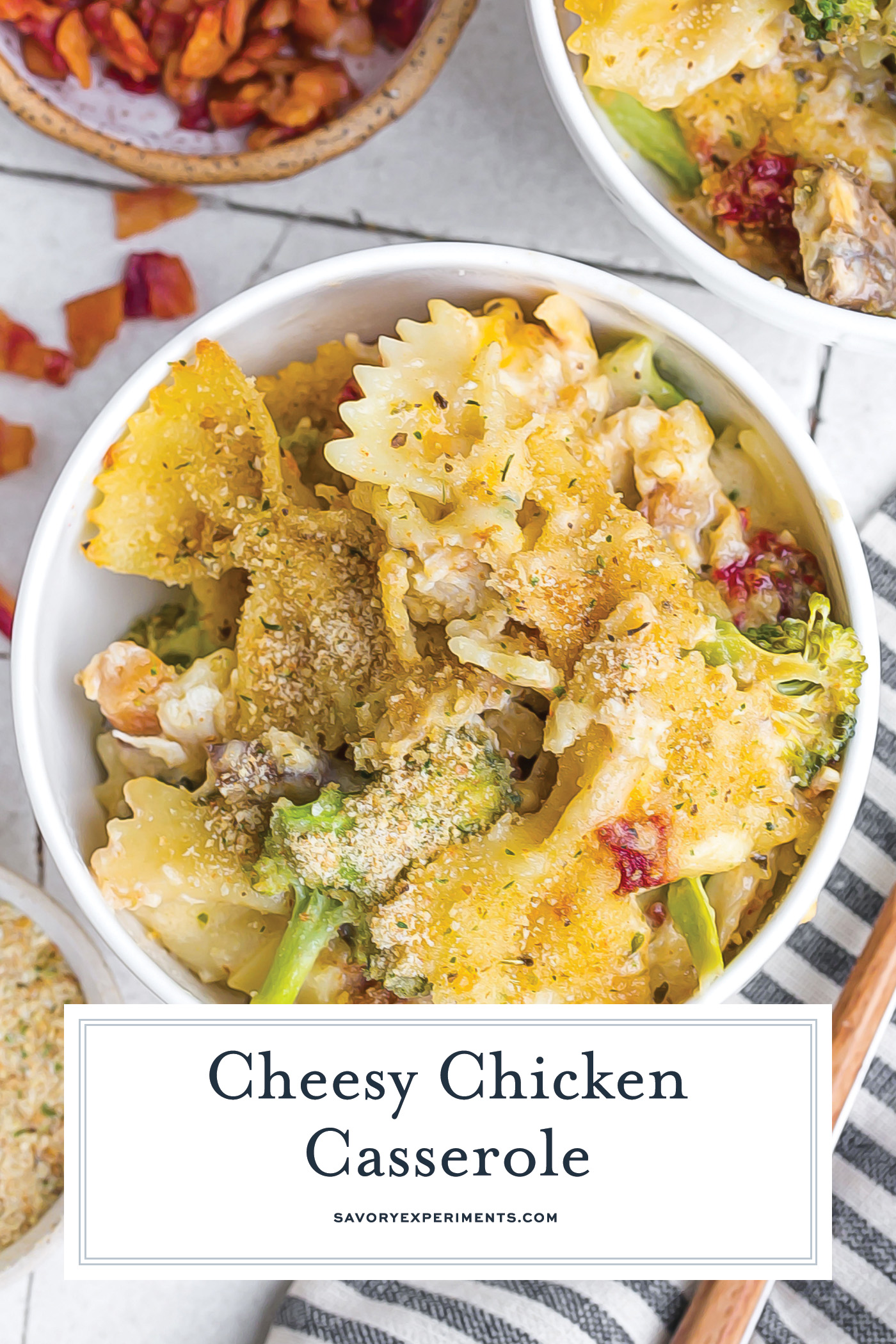 overhead shot of bowl of cheesy chicken casserole with text overlay