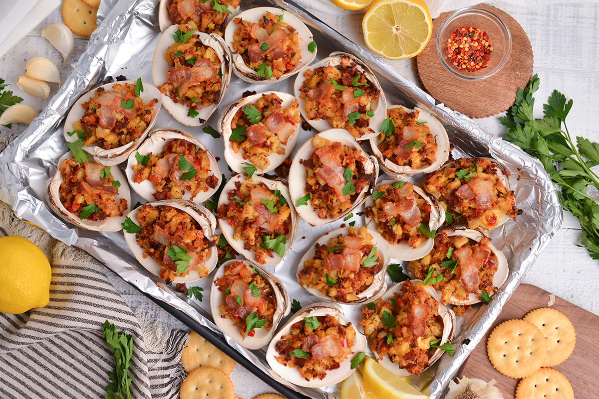 overhead shot of clams casino on baking sheet