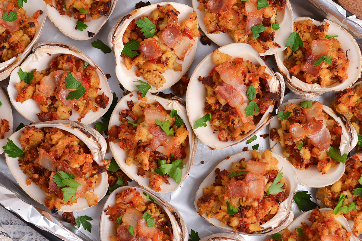 close up overhead shot of clams casino on baking sheet