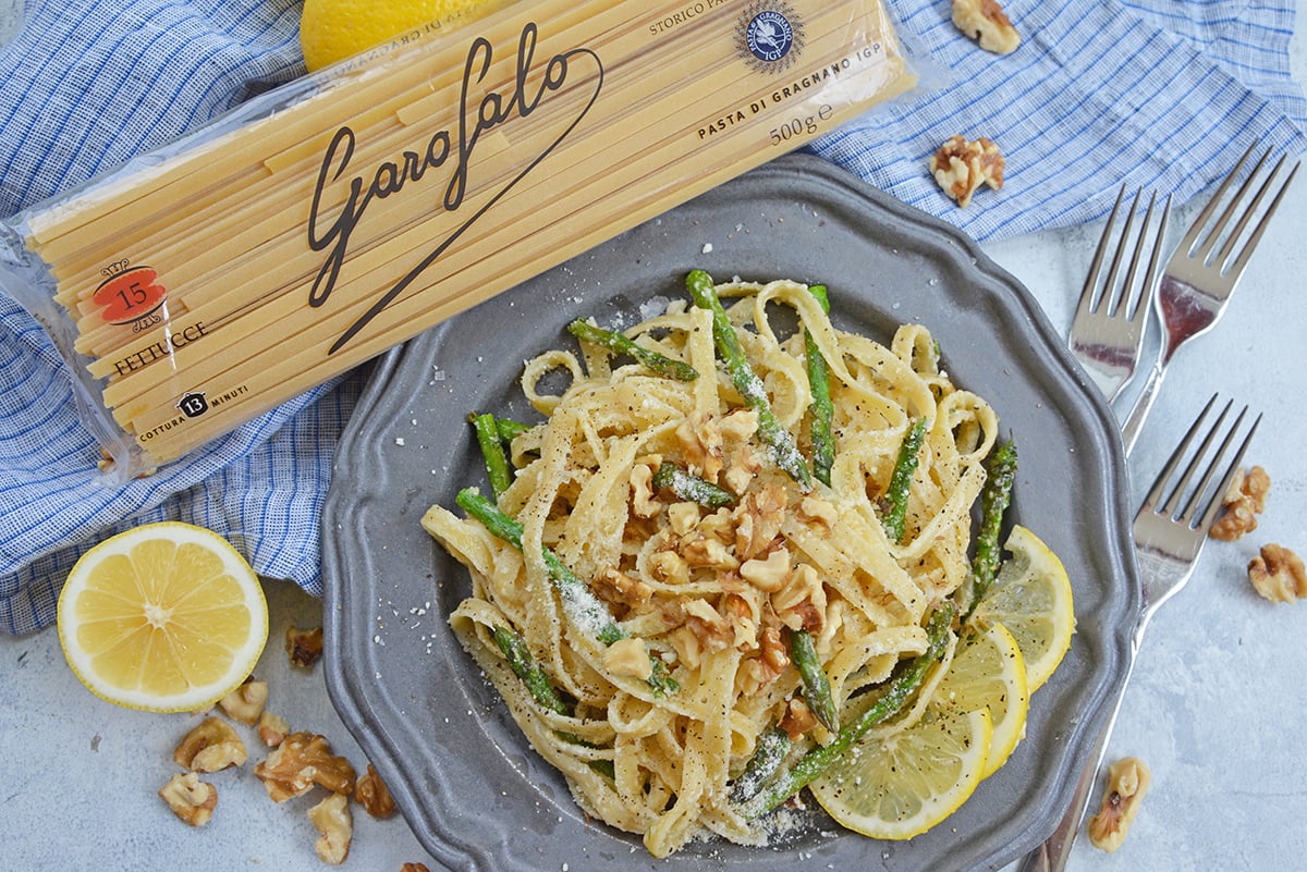 creamy lemon pasta on a metal plate