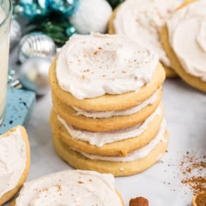 close up angled shot of stack of eggnog cookies