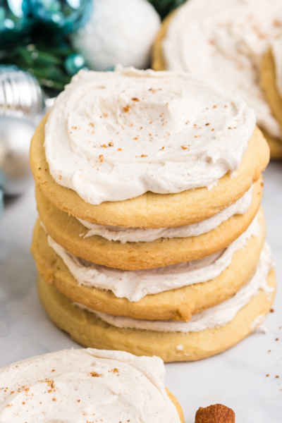 close up angled shot of stack of eggnog cookies