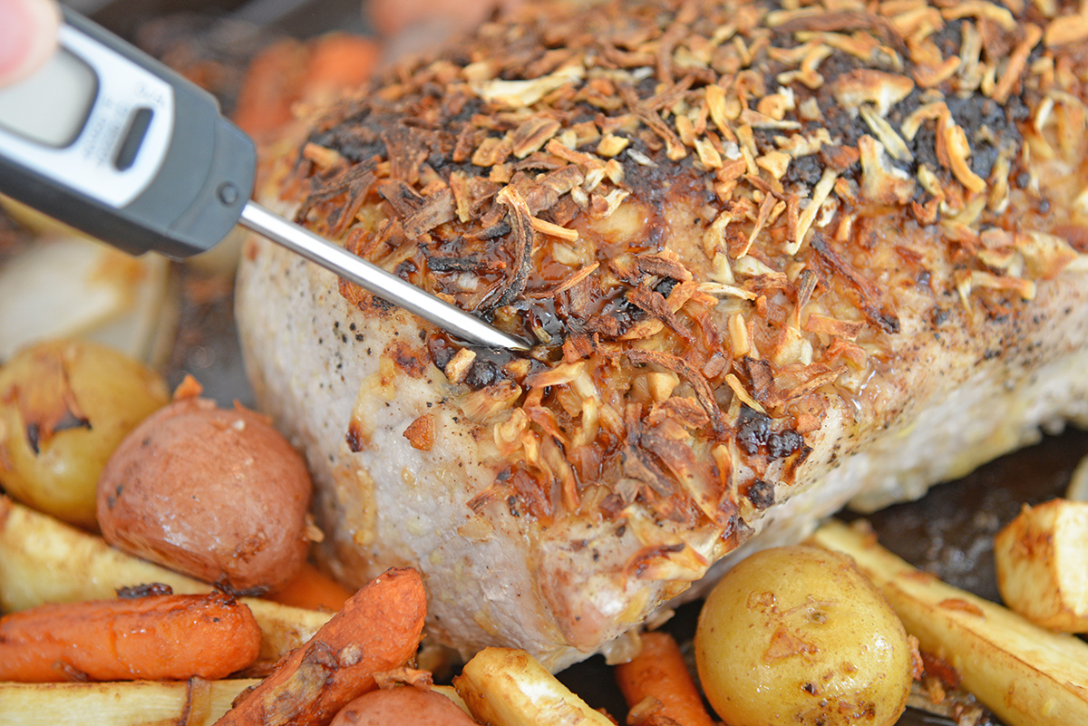 Instant Read Thermometer reading temperature for pork loin