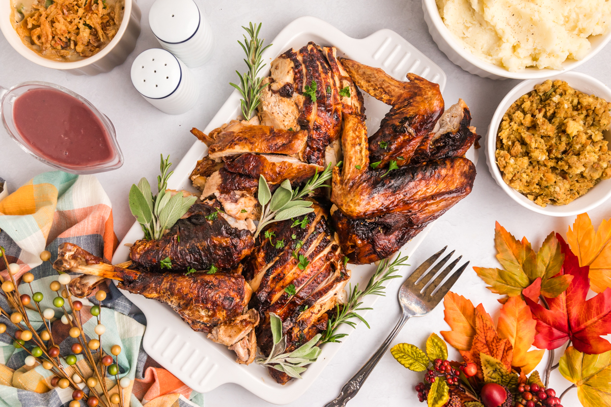 overhead shot of carved fried turkey on a serving platter