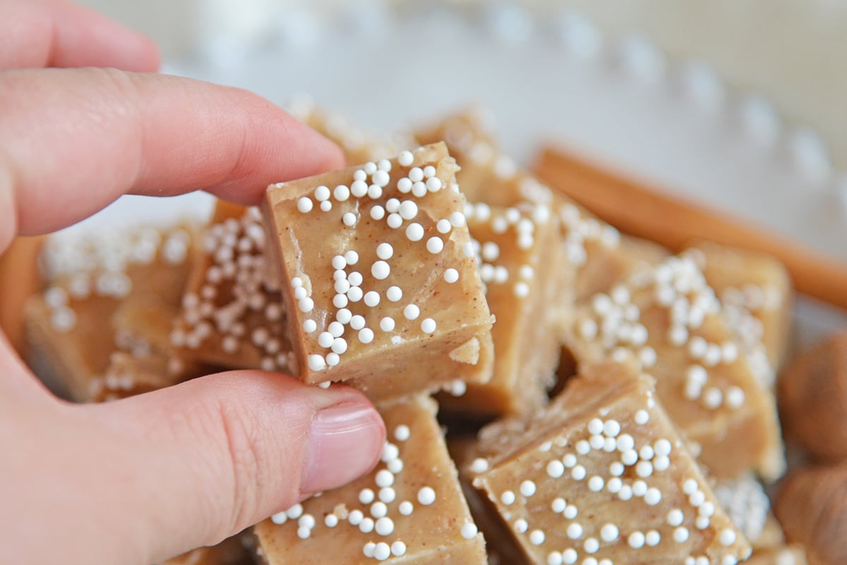 hand picking up gingerbread fudge