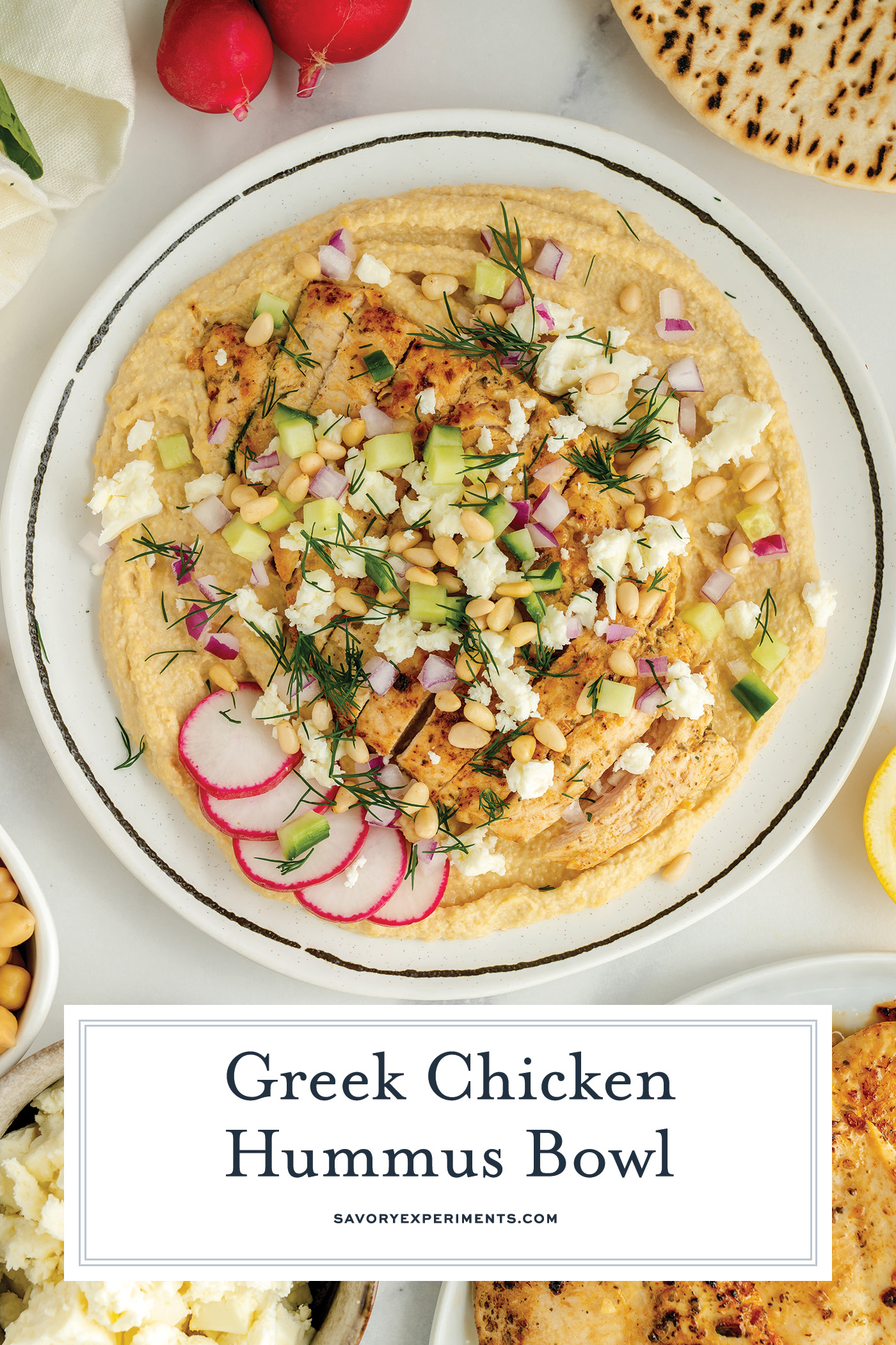 overhead shot of greek chicken hummus bowl with text overlay