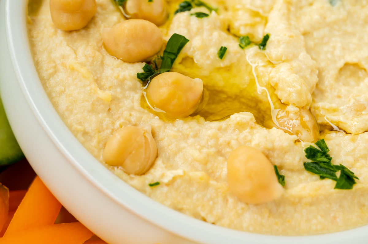 close upshot of bowl of hummus